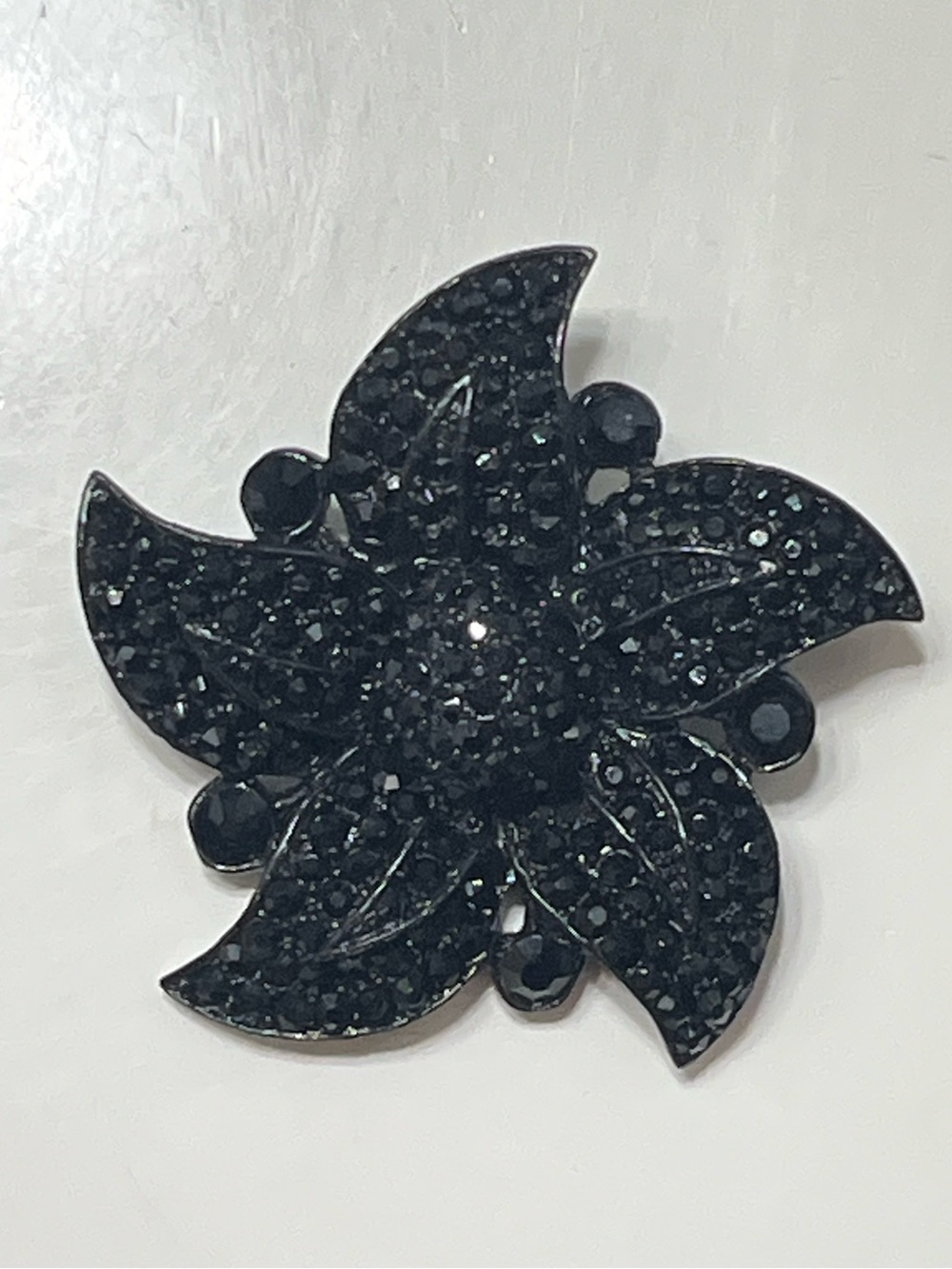Black Floral Crystal Brooch Set In Jappaned Metal